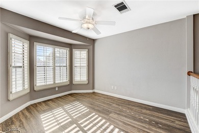 This 2-story home is located in Painted Desert, a guard-gated on Painted Desert Golf Club in Nevada - for sale on GolfHomes.com, golf home, golf lot