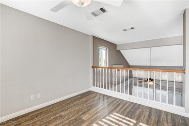 This 2-story home is located in Painted Desert, a guard-gated on Painted Desert Golf Club in Nevada - for sale on GolfHomes.com, golf home, golf lot