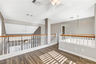 This 2-story home is located in Painted Desert, a guard-gated on Painted Desert Golf Club in Nevada - for sale on GolfHomes.com, golf home, golf lot