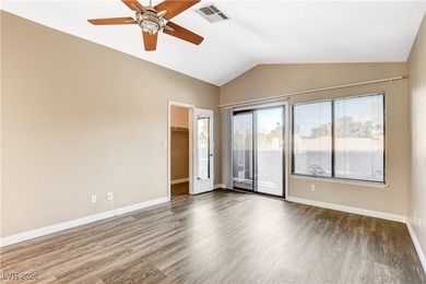 This 2-story home is located in Painted Desert, a guard-gated on Painted Desert Golf Club in Nevada - for sale on GolfHomes.com, golf home, golf lot