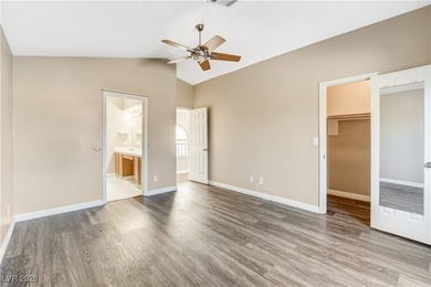 This 2-story home is located in Painted Desert, a guard-gated on Painted Desert Golf Club in Nevada - for sale on GolfHomes.com, golf home, golf lot