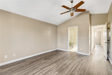 This 2-story home is located in Painted Desert, a guard-gated on Painted Desert Golf Club in Nevada - for sale on GolfHomes.com, golf home, golf lot