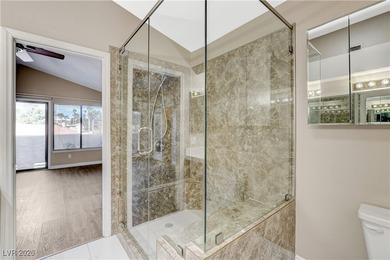 This 2-story home is located in Painted Desert, a guard-gated on Painted Desert Golf Club in Nevada - for sale on GolfHomes.com, golf home, golf lot