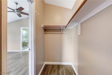 This 2-story home is located in Painted Desert, a guard-gated on Painted Desert Golf Club in Nevada - for sale on GolfHomes.com, golf home, golf lot