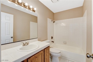 This 2-story home is located in Painted Desert, a guard-gated on Painted Desert Golf Club in Nevada - for sale on GolfHomes.com, golf home, golf lot