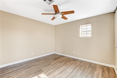 This 2-story home is located in Painted Desert, a guard-gated on Painted Desert Golf Club in Nevada - for sale on GolfHomes.com, golf home, golf lot