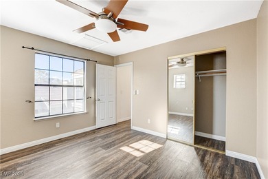 This 2-story home is located in Painted Desert, a guard-gated on Painted Desert Golf Club in Nevada - for sale on GolfHomes.com, golf home, golf lot