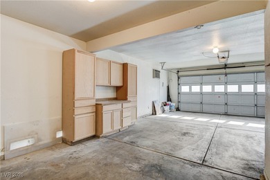 This 2-story home is located in Painted Desert, a guard-gated on Painted Desert Golf Club in Nevada - for sale on GolfHomes.com, golf home, golf lot