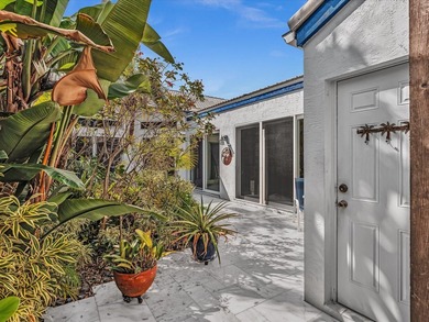 Experience the best of Florida living in this elegant courtyard on The Boca Country Club in Florida - for sale on GolfHomes.com, golf home, golf lot