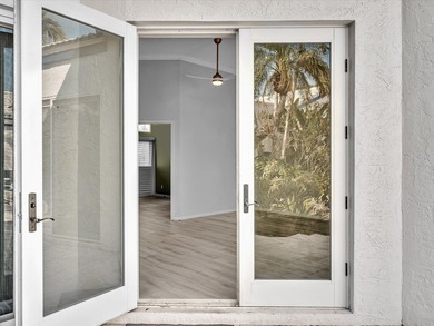 Experience the best of Florida living in this elegant courtyard on The Boca Country Club in Florida - for sale on GolfHomes.com, golf home, golf lot