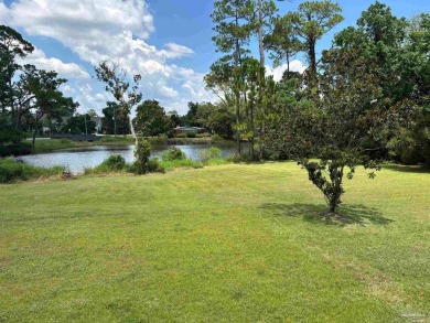 Waterfront Star Lake with convenient golf cart access to on Pensacola Country Club in Florida - for sale on GolfHomes.com, golf home, golf lot