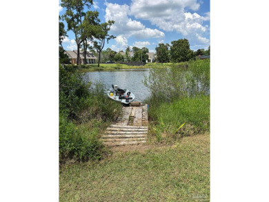 Waterfront Star Lake with convenient golf cart access to on Pensacola Country Club in Florida - for sale on GolfHomes.com, golf home, golf lot