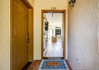 Soaring ceilings, sweeping views, and effortless living define on Tapatio Springs Country Club and Resort in Texas - for sale on GolfHomes.com, golf home, golf lot