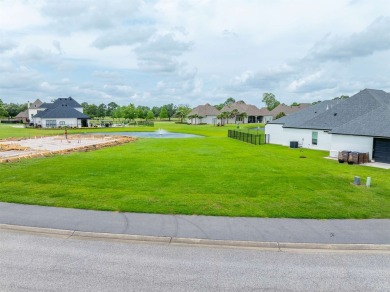 Lakeside living located in the exclusive, gated community of Le on LeTriomphe Golf and Country Club in Louisiana - for sale on GolfHomes.com, golf home, golf lot