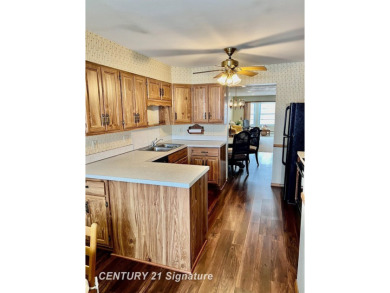 Welcome to this beautifully updated 2-bedroom, 2-bath condo with on Swan Valley Golf Club in Michigan - for sale on GolfHomes.com, golf home, golf lot