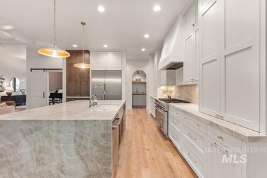 Welcome to this timeless estate perched above SpurWing's iconic on SpurWing Country Club in Idaho - for sale on GolfHomes.com, golf home, golf lot