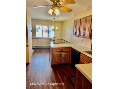 Welcome to this beautifully updated 2-bedroom, 2-bath condo with on Swan Valley Golf Club in Michigan - for sale on GolfHomes.com, golf home, golf lot