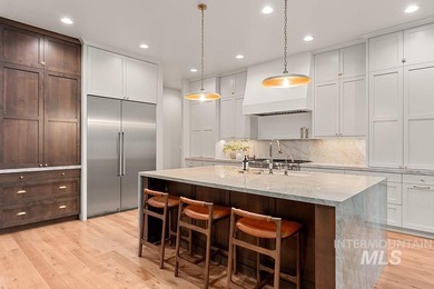 Welcome to this timeless estate perched above SpurWing's iconic on SpurWing Country Club in Idaho - for sale on GolfHomes.com, golf home, golf lot