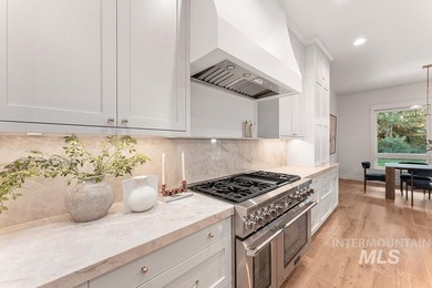 Welcome to this timeless estate perched above SpurWing's iconic on SpurWing Country Club in Idaho - for sale on GolfHomes.com, golf home, golf lot