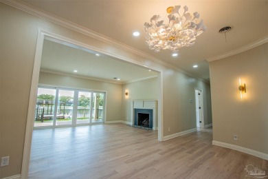 This stunning 3,663 sq. ft. home has been meticulously updated on Pensacola Country Club in Florida - for sale on GolfHomes.com, golf home, golf lot