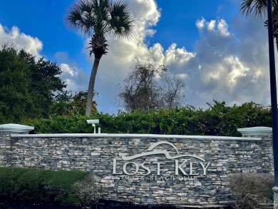 Experience resort-style living at its finest in this beautifully on Lost Key Golf Club in Florida - for sale on GolfHomes.com, golf home, golf lot