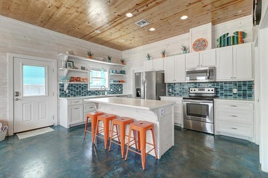 Super cute 4 bdrm, 4.5 bath beach retreat with its own private on Palmilla Beach Golf Club in Texas - for sale on GolfHomes.com, golf home, golf lot