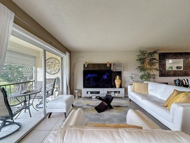 This charming 2-bed, 2-bath home features tile floors, neutral on Hollybrook Golf and Tennis Club  in Florida - for sale on GolfHomes.com, golf home, golf lot