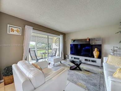 This charming 2-bed, 2-bath home features tile floors, neutral on Hollybrook Golf and Tennis Club  in Florida - for sale on GolfHomes.com, golf home, golf lot