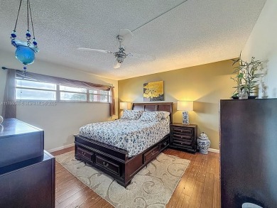 This charming 2-bed, 2-bath home features tile floors, neutral on Hollybrook Golf and Tennis Club  in Florida - for sale on GolfHomes.com, golf home, golf lot