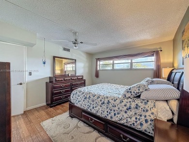 This charming 2-bed, 2-bath home features tile floors, neutral on Hollybrook Golf and Tennis Club  in Florida - for sale on GolfHomes.com, golf home, golf lot