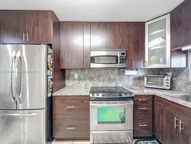 This charming 2-bed, 2-bath home features tile floors, neutral on Hollybrook Golf and Tennis Club  in Florida - for sale on GolfHomes.com, golf home, golf lot