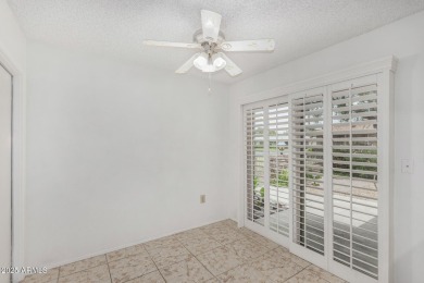 Welcome to this delightful home situated on a quiet, tree-lined on PalmBrook Country Club in Arizona - for sale on GolfHomes.com, golf home, golf lot