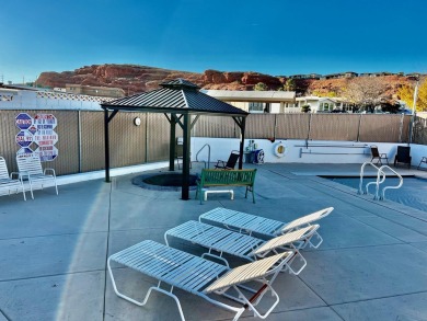 Check out this extra deep RV lot with a privacy wall in the back on Green Spring Country Club in Utah - for sale on GolfHomes.com, golf home, golf lot