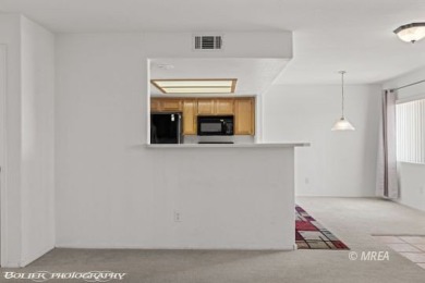 DON'T DO THOSE STEPS. Discover comfortable living in this on The Oasis Golf Club in Nevada - for sale on GolfHomes.com, golf home, golf lot