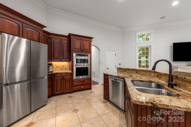 Experience a one-of-a-kind floor plan with this stunning on Cowans Ford Country Club in North Carolina - for sale on GolfHomes.com, golf home, golf lot