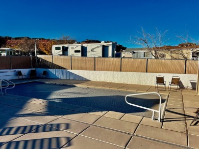 Check out this extra deep RV lot with a privacy wall in the back on Green Spring Country Club in Utah - for sale on GolfHomes.com, golf home, golf lot