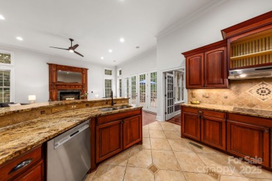Experience a one-of-a-kind floor plan with this stunning on Cowans Ford Country Club in North Carolina - for sale on GolfHomes.com, golf home, golf lot