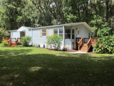 Welcome to Your Private Oasis w Peace and Serenity Only Nature on Bay Tree Golf Course in Florida - for sale on GolfHomes.com, golf home, golf lot