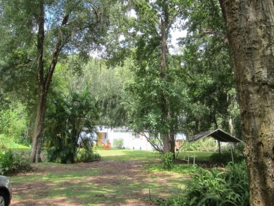 Welcome to Your Private Oasis w Peace and Serenity Only Nature on Bay Tree Golf Course in Florida - for sale on GolfHomes.com, golf home, golf lot