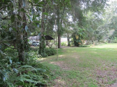 Welcome to Your Private Oasis w Peace and Serenity Only Nature on Bay Tree Golf Course in Florida - for sale on GolfHomes.com, golf home, golf lot