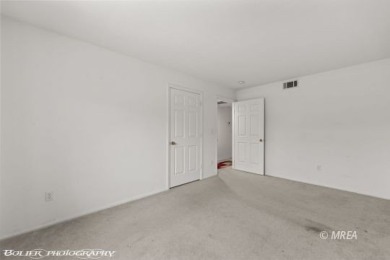 DON'T DO THOSE STEPS. Discover comfortable living in this on The Oasis Golf Club in Nevada - for sale on GolfHomes.com, golf home, golf lot