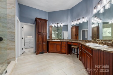 Experience a one-of-a-kind floor plan with this stunning on Cowans Ford Country Club in North Carolina - for sale on GolfHomes.com, golf home, golf lot