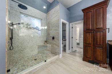 Experience a one-of-a-kind floor plan with this stunning on Cowans Ford Country Club in North Carolina - for sale on GolfHomes.com, golf home, golf lot