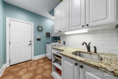 Experience a one-of-a-kind floor plan with this stunning on Cowans Ford Country Club in North Carolina - for sale on GolfHomes.com, golf home, golf lot