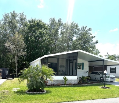 Discover this adorable and meticulously cared-for 2-bedroom home on Schalamar Creek Golf and Country Club in Florida - for sale on GolfHomes.com, golf home, golf lot