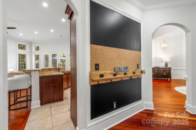 Experience a one-of-a-kind floor plan with this stunning on Cowans Ford Country Club in North Carolina - for sale on GolfHomes.com, golf home, golf lot