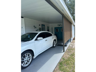 Discover this adorable and meticulously cared-for 2-bedroom home on Schalamar Creek Golf and Country Club in Florida - for sale on GolfHomes.com, golf home, golf lot