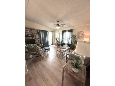 Discover this adorable and meticulously cared-for 2-bedroom home on Schalamar Creek Golf and Country Club in Florida - for sale on GolfHomes.com, golf home, golf lot