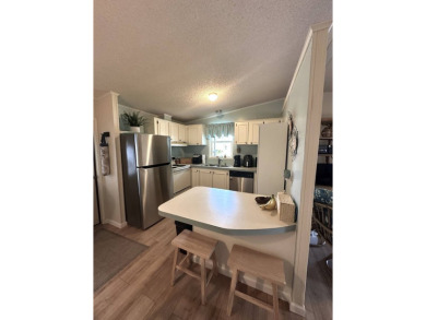 Discover this adorable and meticulously cared-for 2-bedroom home on Schalamar Creek Golf and Country Club in Florida - for sale on GolfHomes.com, golf home, golf lot