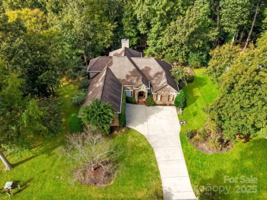 Experience a one-of-a-kind floor plan with this stunning on Cowans Ford Country Club in North Carolina - for sale on GolfHomes.com, golf home, golf lot